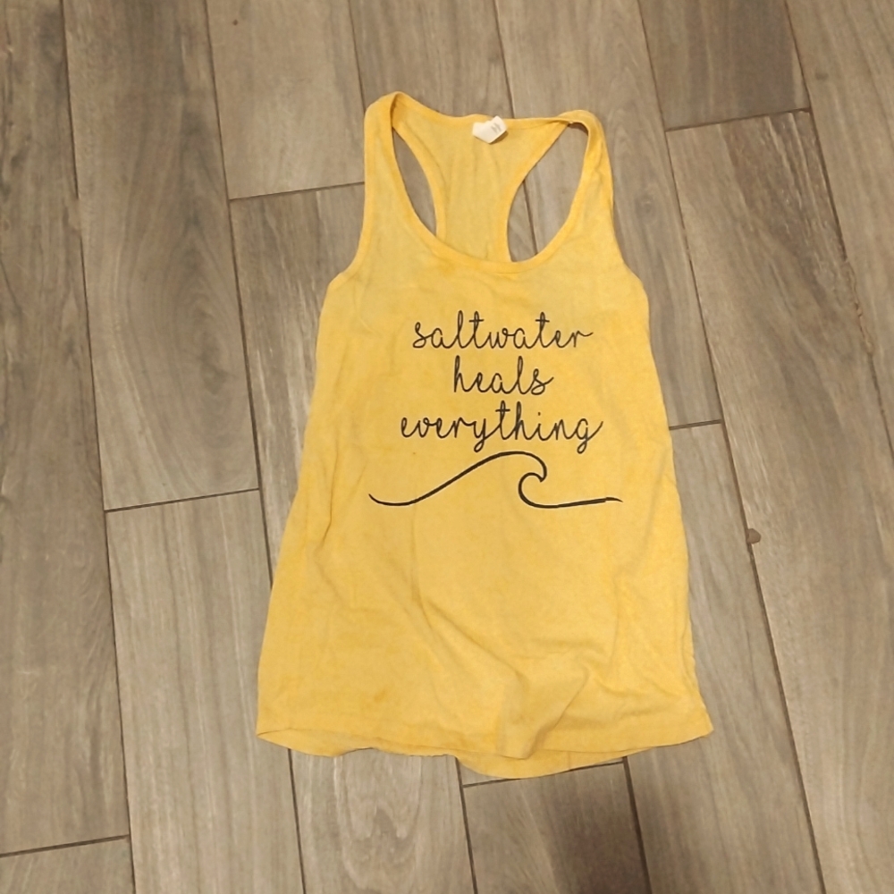 An ideal tea by Next Level medium tank top